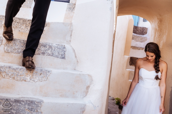 Santorini, Greece Pre Wedding Portraits on the stucco steps 