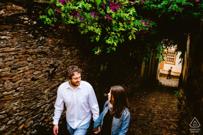 Ouro Preto engaged couple walking for a portrait in Brazil