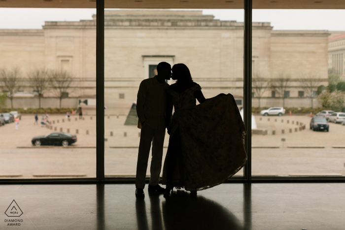 Photo by: <a href="https://www.wpja.com/photos/diamond-award-top-wedding-engagement-photographer/2422241">Edward Underwood - Washington DC District Of Columbia National Portrait Gallery DC | Bride-to-be had an amazing, hand-crafted dress made for this session | highlighted with a cool sihloutte