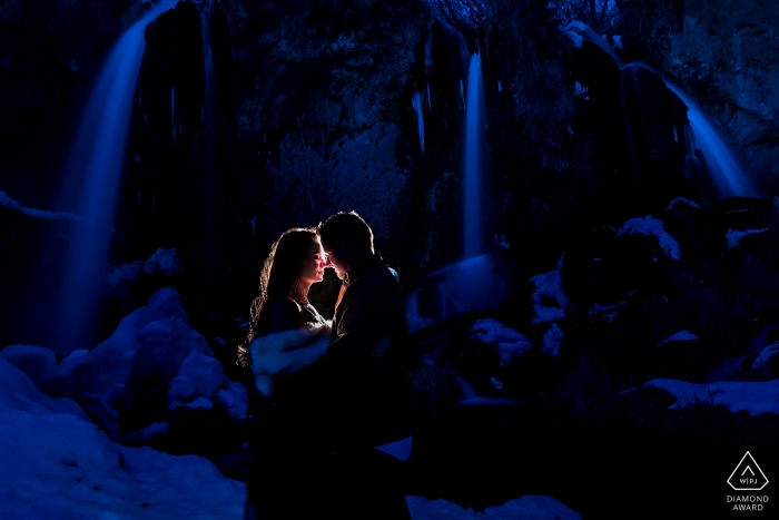 Rifle Falls Engagement Photographer - Bride and groom by CO waterfall 