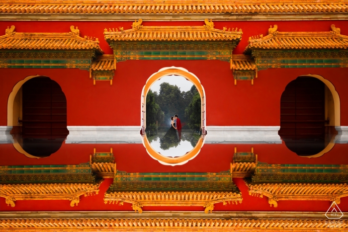 Photo by: <a href="https://www.wpja.com/photos/diamond-award-top-wedding-engagement-photographer/2429436">Vincent Mu - Beijing Beijing engagement portrait of a couple frames in a centered window opening
