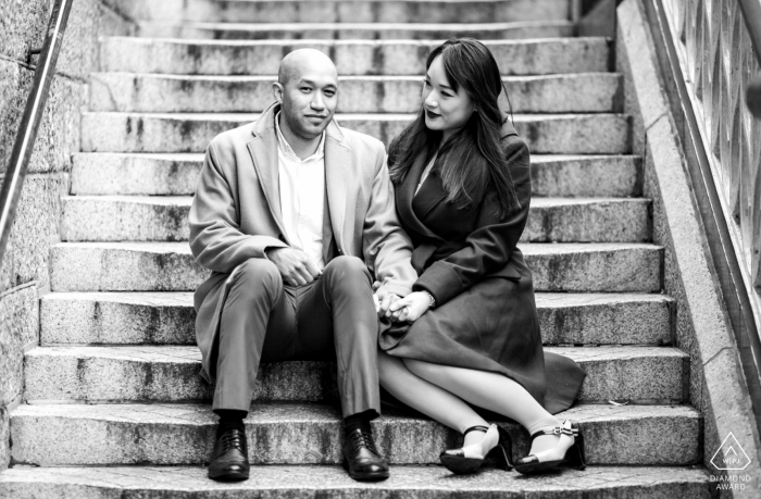 Photo by: <a href="https://www.wpja.com/photos/diamond-award-top-wedding-engagement-photographer/2425341">Gyula Lovaszi - Ealing London Couple Sitting on the Stairs - London Engagement Session