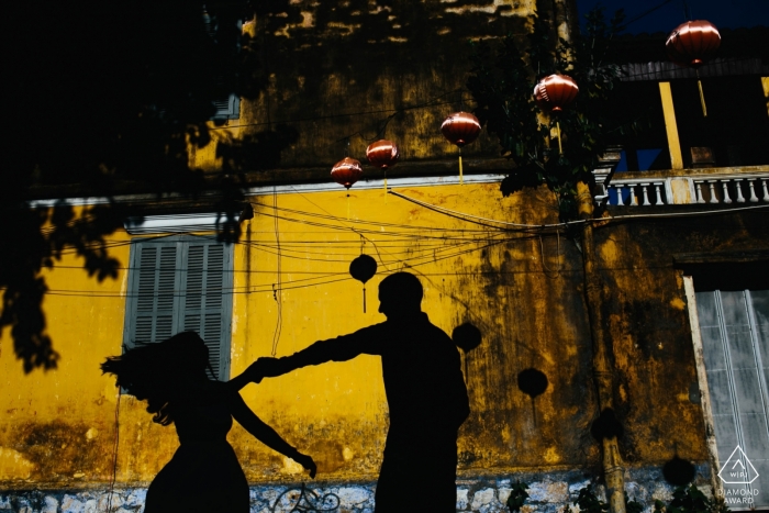Photo by: <a href="https://www.wpja.com/photos/diamond-award-top-wedding-engagement-photographer/2424551">Trung Dinh - Da Nang Da Nang Pre-wedding silhouette portrait of a couple in Hoi An Vietnam