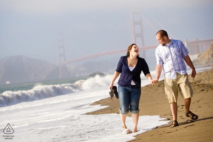 Photo by: <a href="https://www.wpja.com/photos/diamond-award-top-wedding-engagement-photographer/2429101">Kevin Trimmer - Providence Rhode Island Couple walking on beach - SF Engagement Photographer