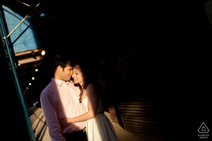 Photo by: <a href="https://www.wpja.com/photos/diamond-award-top-wedding-engagement-photographer/2429141">Kevin Trimmer - Providence Rhode Island Couple in highlight on street - Rhode Island Pre Wedding Photographer