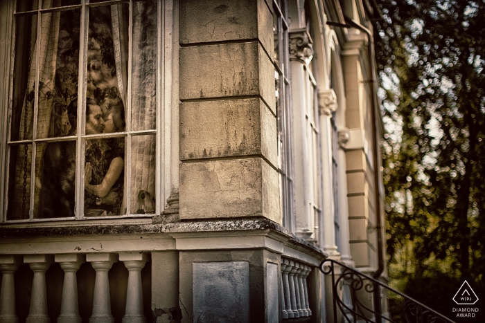 Photo by: <a href="https://www.wpja.com/photos/diamond-award-top-wedding-engagement-photographer/2426096">Matteo Originale - Bolano La Spezia engagement love from Forte dei Marmi - window portraits of this couple