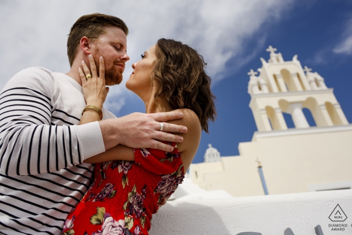 Photo by: <a href="https://www.wpja.com/photos/diamond-award-top-wedding-engagement-photographer/2427971">Ufuk Sarisen - Istanbul santorini engagement shooting - outside in the sun
