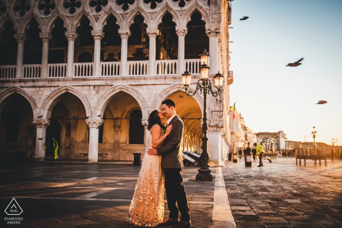 Venice engagement photo of couple in a public square