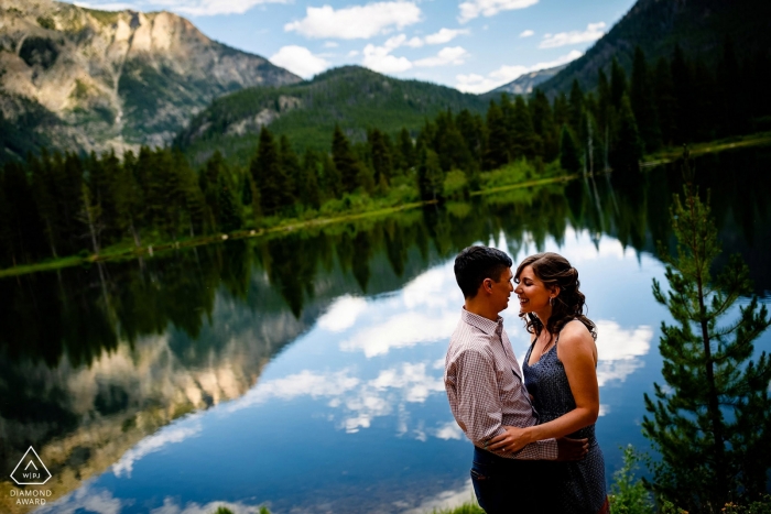 Photo by: <a href="https://www.wpja.com/photos/diamond-award-top-wedding-engagement-photographer/2427151">Trent Gillespie - Silverthorne Colorado Framed couple in a mountain lake near Copper Mountain in Colorado - Engagement Session