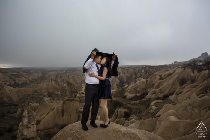 cappadocia engagement photo shooting in the rain outside