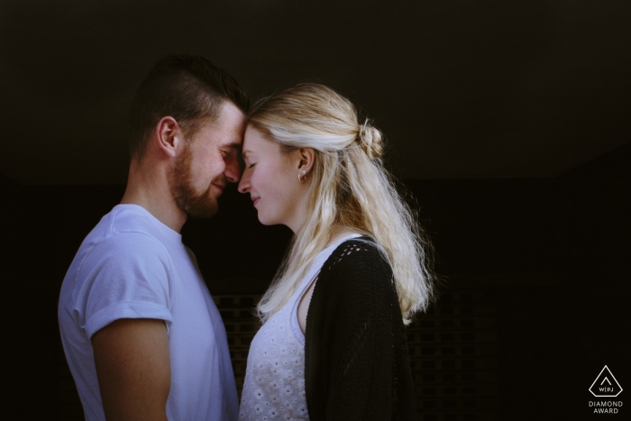 Photo by: <a href="https://www.wpja.com/photos/diamond-award-top-wedding-engagement-photographer/2434406">Rosa Engel - Aachen Nordrhein-Westfalen Engagement Photos from Aachen - face-to-face profile portrait with the black background