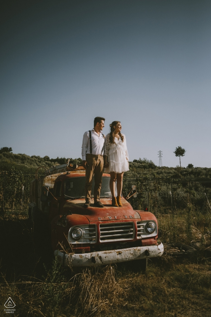 Photo by: <a href="https://www.wpja.com/photos/diamond-award-top-wedding-engagement-photographer/2439816">Emre Nesli - İstanbul Istanbul Mersin/Turkey engagement portrait session - love on a Bedford - abandoned truck in an open field