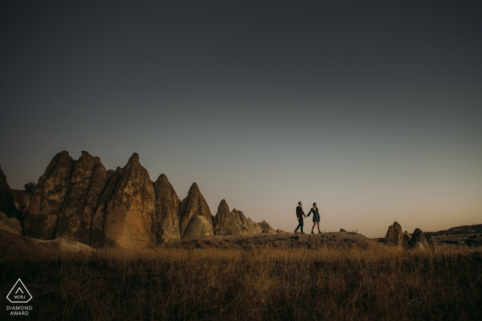 Photo by: <a href="https://www.wpja.com/photos/diamond-award-top-wedding-engagement-photographer/2439781">Emre Nesli - İstanbul Istanbul cappadocia pre-wedding portraits of a couple walking in to the history books