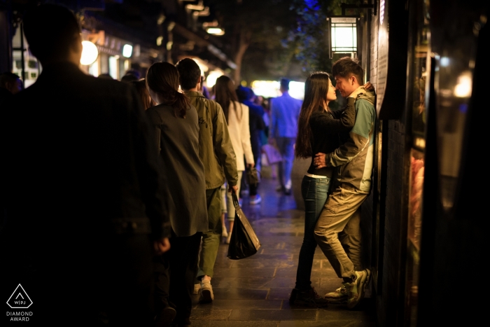 Photo by: <a href="https://www.wpja.com/photos/diamond-award-top-wedding-engagement-photographer/2434081">Wenxue Zhang - Dalian china Pre-Wedding Engagement Portraits from the busy streets