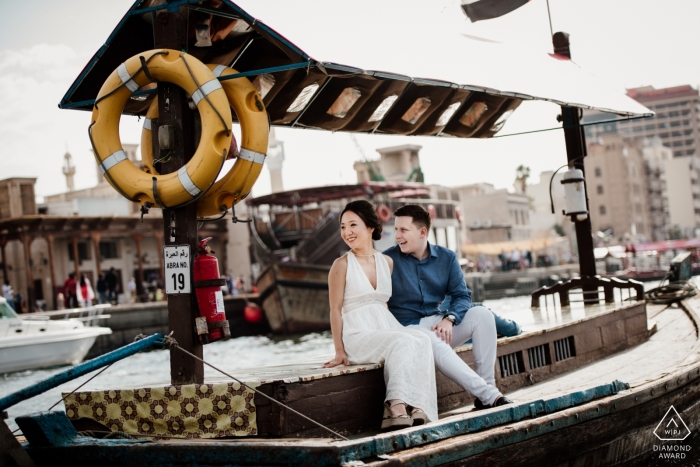 Photo by: <a href="https://www.wpja.com/photos/diamond-award-top-wedding-engagement-photographer/2450666">Bindi Richardson - Dubai Abra Ride on Dubai Creek - UAE engagement portrait session on the water in a boat