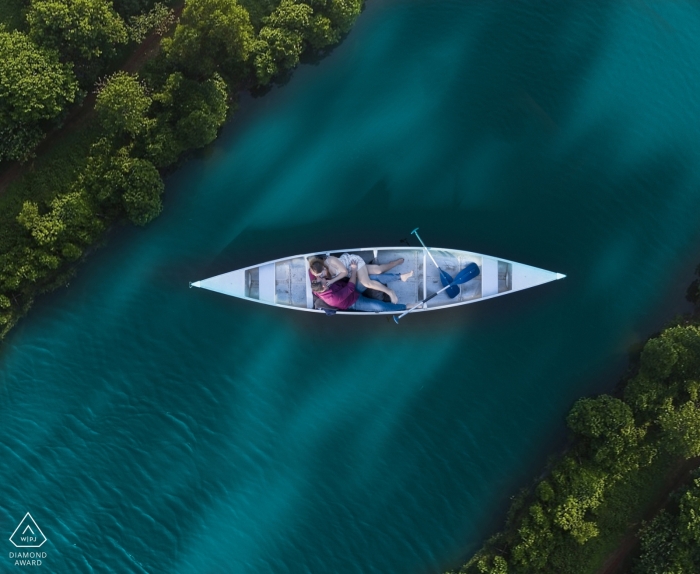 Photo by: <a href="https://www.wpja.com/photos/diamond-award-top-wedding-engagement-photographer/2438476">Julie Ambos - Key West Florida Engagement portrait photos in Key West - Creative Engagement Shoot in a canoe with the drone