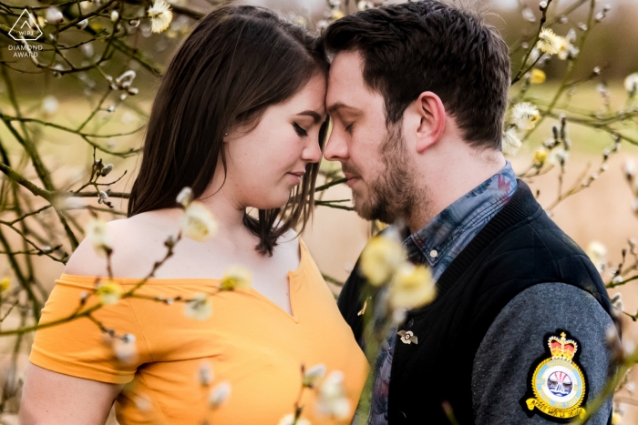 Photo by: <a href="https://www.wpja.com/photos/diamond-award-top-wedding-engagement-photographer/2433141">Jason Huckle - Rushden Northamptonshire Rudyard Lake, Staffordshire engagement portrait with blooming trees