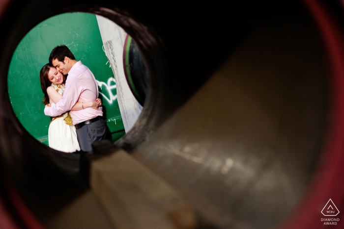 Photo by: <a href="https://www.wpja.com/photos/diamond-award-top-wedding-engagement-photographer/2452196">Kevin Trimmer - Providence Rhode Island Brooklyn, New York pre wedding portraits - engaged Couple in circle on street