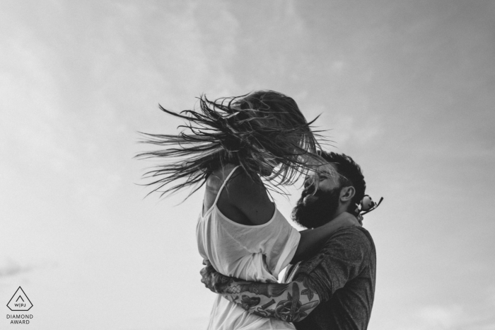 Key West engagement shoot in black-and-white | Up in the Air - let your hair fly in the wind