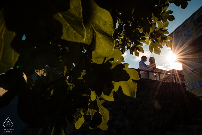 Photo by: <a href="https://www.wpja.com/photos/diamond-award-top-wedding-engagement-photographer/2451521">Tsvetelina Deliyska - Sofia Sofia Sozopol, Bulgaria pre-wedding photo session | Sun Flares and leaves. Love and adoration.