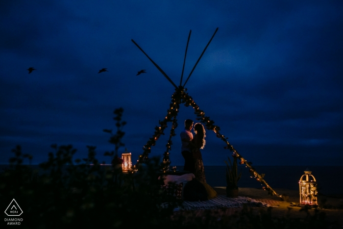 Photo by: <a href="https://www.wpja.com/photos/diamond-award-top-wedding-engagement-photographer/2450141">Tanya Parada - Los Angeles California San Diego Engagement portrait session at dusk - teepee, lanterns and early evening for this couple shoot