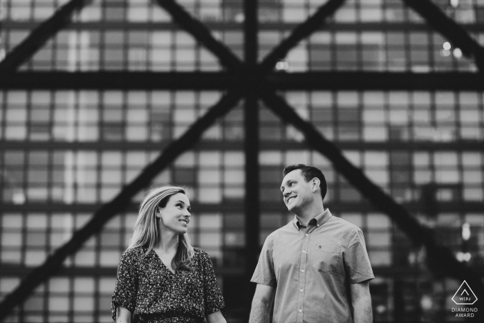 Washington DC couple Pose for engagement portraits - black-and-white In to triangles