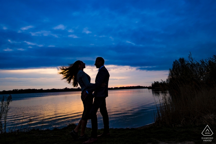 Photo by: <a href="https://www.wpja.com/photos/diamond-award-top-wedding-engagement-photographer/2444786">Corrine Ponsen - Maarssen Utrecht Netherlands engagement photo session at the water with her flying hair