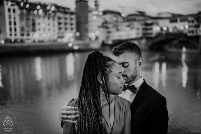 Florence Old Bridge Engagement Session in Tuscany above the water.