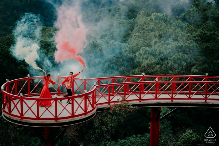 Photo by: <a href="https://www.wpja.com/photos/diamond-award-top-wedding-engagement-photographer/2464241">Vu Nguyen - Ho Chi Minh Vietnam Da Lat Engagement Photoshoot with Smoke Grenades on a Red Bridge