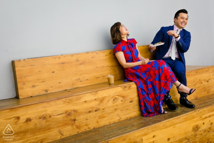 Photo by: <a href="https://www.wpja.com/photos/diamond-award-top-wedding-engagement-photographer/2464906">Tanya Parada - Los Angeles California Venice, California Engagement Portrait with a Couple Laughing over breakfast