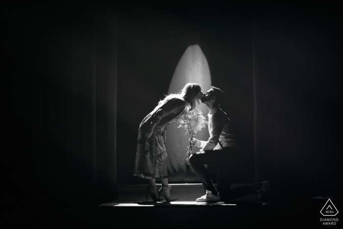 Photo by: <a href="https://www.wpja.com/photos/diamond-award-top-wedding-engagement-photographer/2472386">Paolo Ferrera - Alvito Frosinone This black and white photo of a couple kissing was captured during an engagement photo session that took place at the municipal theater of Alvito