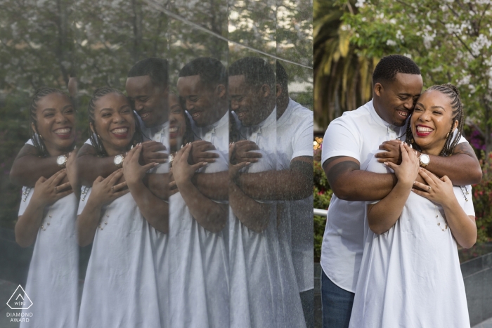 A couple is reflected on a polished stone surface in Union Square as they hold each other during their pre-wedding photoshoot by a San Francisco, CA photographer.