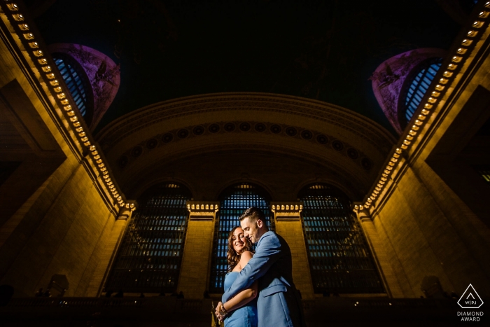 Photo by: <a href="https://www.wpja.com/photos/diamond-award-top-wedding-engagement-photographer/2495926">Miguel Gonzalez - Abington Pennsylvania Eliminating everyone in crowded Grand Central station and just making them and the architecture the focus.