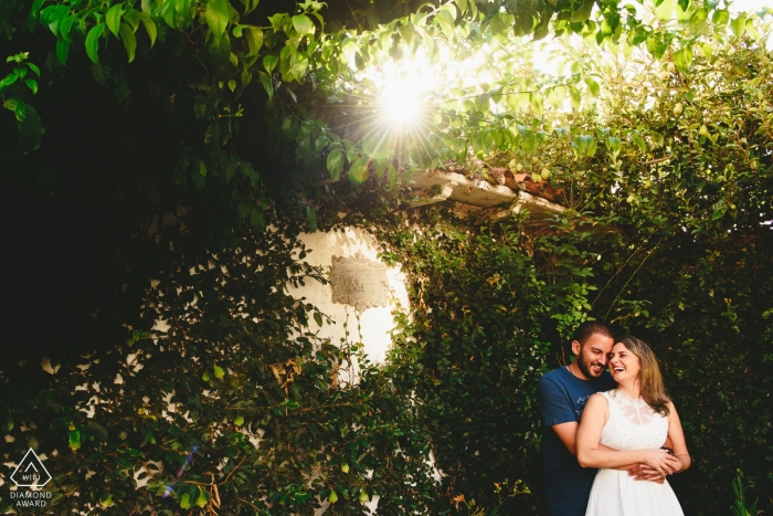 Photo by: <a href="https://www.wpja.com/photos/diamond-award-top-wedding-engagement-photographer/2496161">Vinicius Terror - Ouro Preto Minas Gerais Pre Wedding portrait in the sun and trees of Ouro Preto
