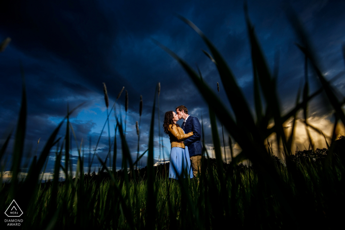 Photo by: <a href="https://www.wpja.com/photos/diamond-award-top-wedding-engagement-photographer/2498271">Justin Edmonds - Denver Colorado Engaged couple share a moment at Evergreen Park during their engagement session.