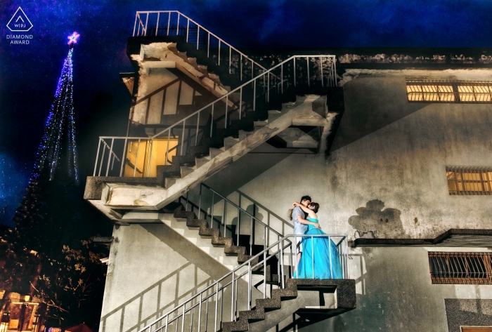 Photo by: <a href="https://www.wpja.com/photos/diamond-award-top-wedding-engagement-photographer/2509176">Tao-Hsuan Tzu - Taipei A couple kissing on a stairwell in Hualien was captured by a Taiwan engagement photographer
