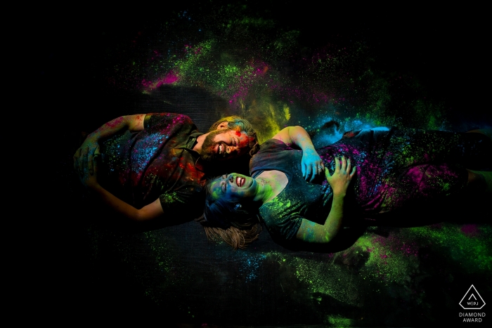 Photo by: <a href="https://www.wpja.com/photos/diamond-award-top-wedding-engagement-photographer/2513446">Jesse La Plante - Boulder Colorado Boulder, CO (backyard) Engaged couple portrait on trampoline