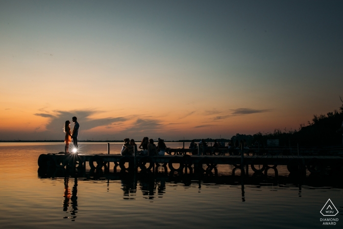 Photo by: <a href="https://www.wpja.com/photos/diamond-award-top-wedding-engagement-photographer/2522386">Jose Miguel Perez Nunez - Murcia Murcia Valencia sunset engagement shoot at the water with a light
