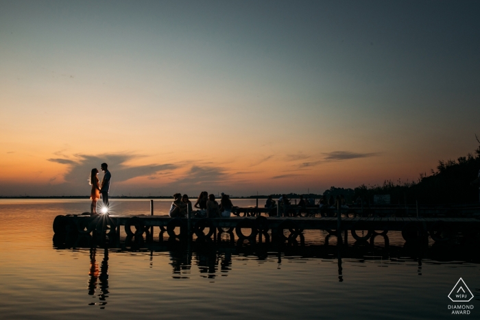 Valencia sunset engagement shoot at the water with a light