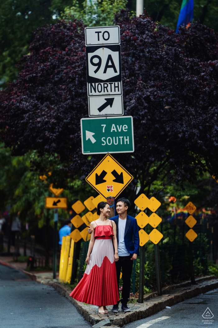 Photo by: <a href="https://www.wpja.com/photos/diamond-award-top-wedding-engagement-photographer/2522901">Wenjie Han - Long Island City New York West Village, NY Pre Wedding Portrait of a couple in front of traffic sign