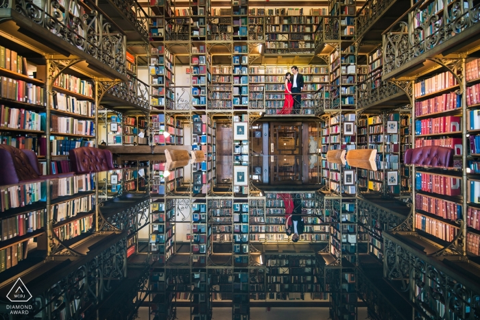 Uris Library at Cornell University Engagement Photographer: I used the reflection on the library desk to create this "up side down" look-like image. 