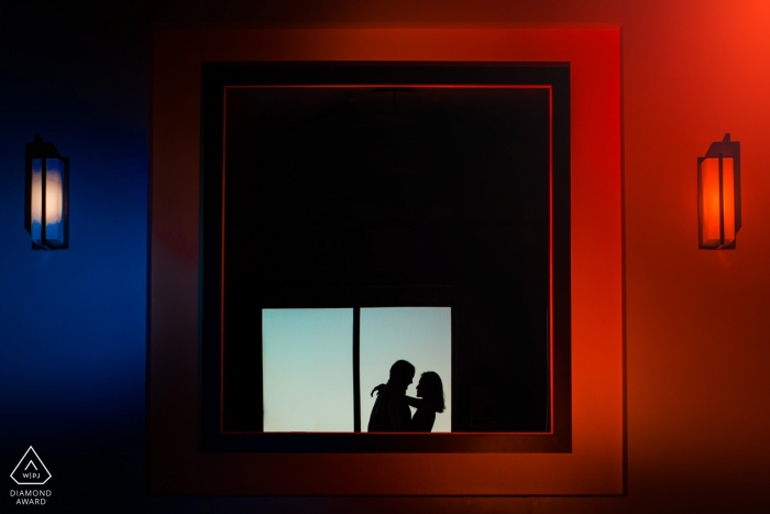 Photo by: <a href="https://www.wpja.com/photos/diamond-award-top-wedding-engagement-photographer/2530851">Anastasiia Polyakov - Arlington Virginia Couple's apartment building elevator hallway - Silhouette engagement portrait in Arlington Virginia