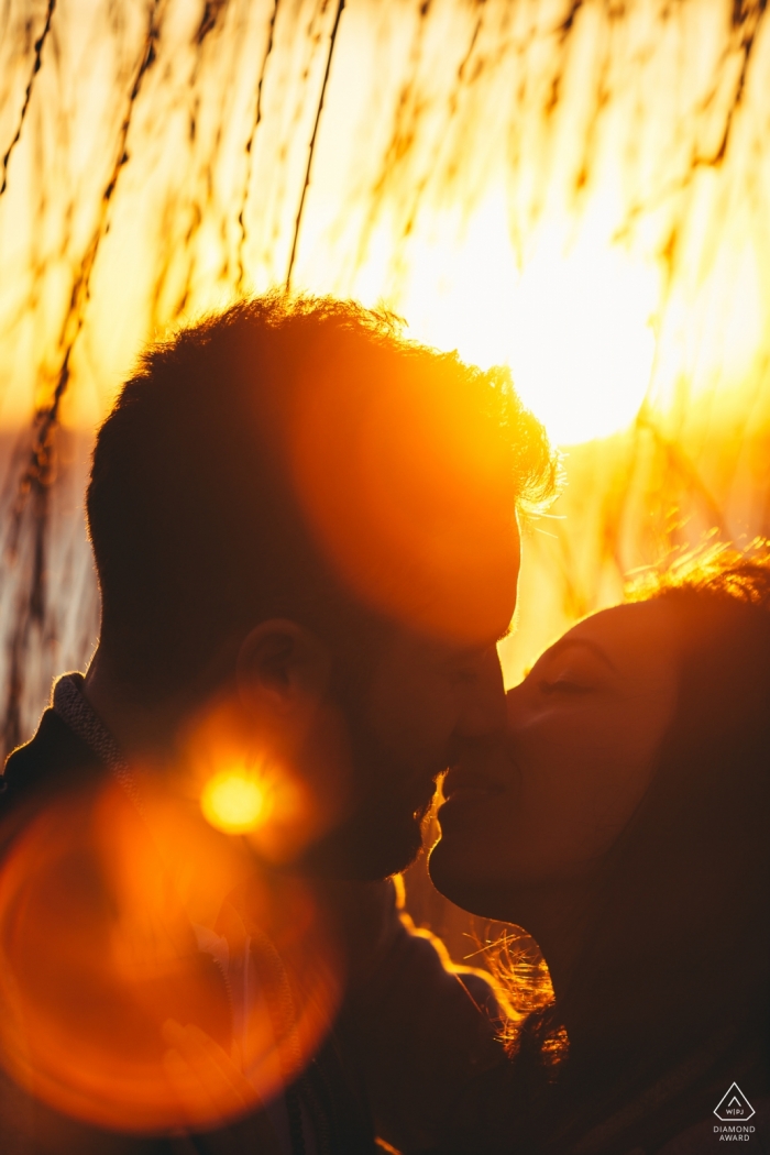Photo by: <a href="https://www.wpja.com/photos/diamond-award-top-wedding-engagement-photographer/2533871">Massimiliano Esposito - Orvieto Terni Lago di Bracciano Rome - Tenuta di Polline Engagement Shoot - Kiss on the sunset by the lake