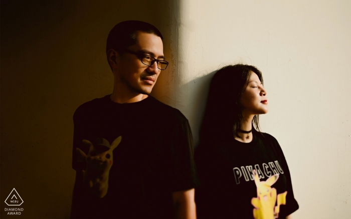 Photo by: <a href="https://www.wpja.com/photos/diamond-award-top-wedding-engagement-photographer/2537956">Lin Yang - Quanzhou Engaged Lovers lean against the wall in Tian'an Park for a pre wedding portrait