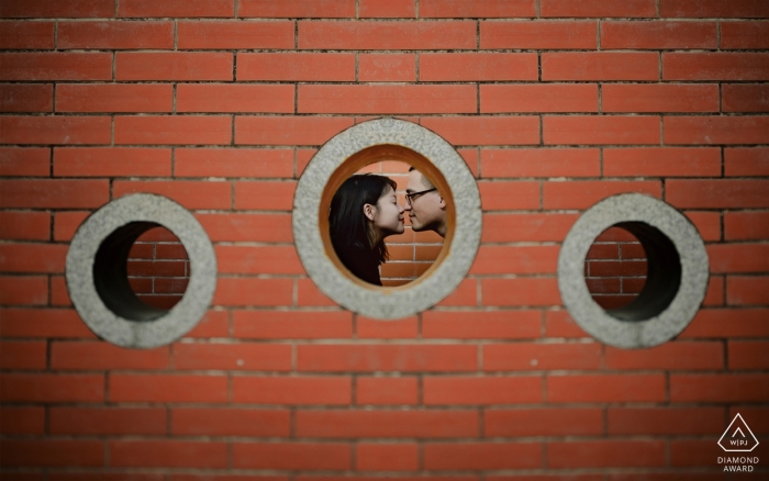 Photo by: <a href="https://www.wpja.com/photos/diamond-award-top-wedding-engagement-photographer/2537966">Lin Yang - Quanzhou Tian'an Park Engagment Portrait Photography - Lovers bump noses in a circle