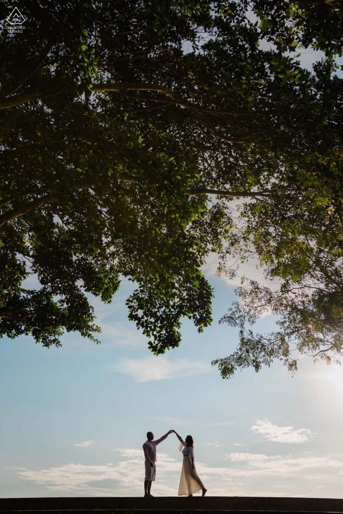 Niteroi - RJ / Brazil prewedding shoot - A couple dancing alone with each other for engagement portraits