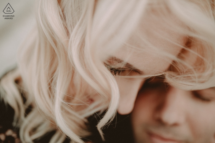 Intimate engagement portrait of a couple at Budapest Fisherman Bastion 