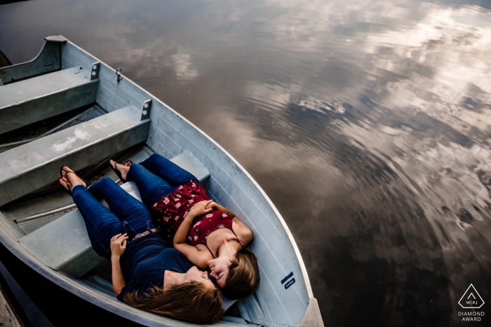 Photo by: <a href="https://www.wpja.com/photos/diamond-award-top-wedding-engagement-photographer/2543278">Kathleen Ricker - Linthicum Heights Maryland University of Delaware Portrait Session in a Small Boat on the Water.