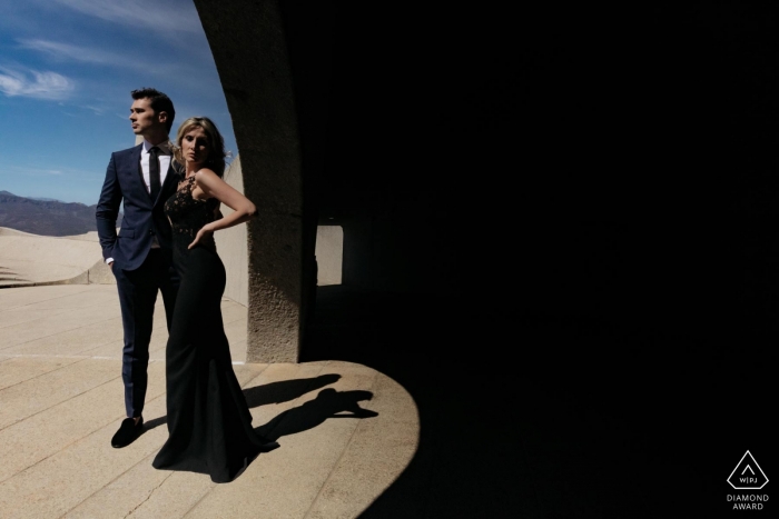 Photo by: <a href="https://www.wpja.com/photos/diamond-award-top-wedding-engagement-photographer/2543526">Eric Corbacho - São Caetano do Sul São Paulo Cape Town engagement portrait of couple using shadow to create a contrast