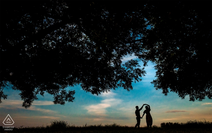 A couple dances at Dennis Vineyards during their engagement portrait session.